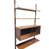 Teak shelving system with glass cabinet, marked made in Denmark, 1960.
