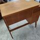 Vintage 1950s side desk with tapered legs.