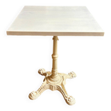 Bistro table in beige cast iron and ecru wood