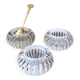 Trio of salt shakers, pepper shakers, molded glass salt shakers