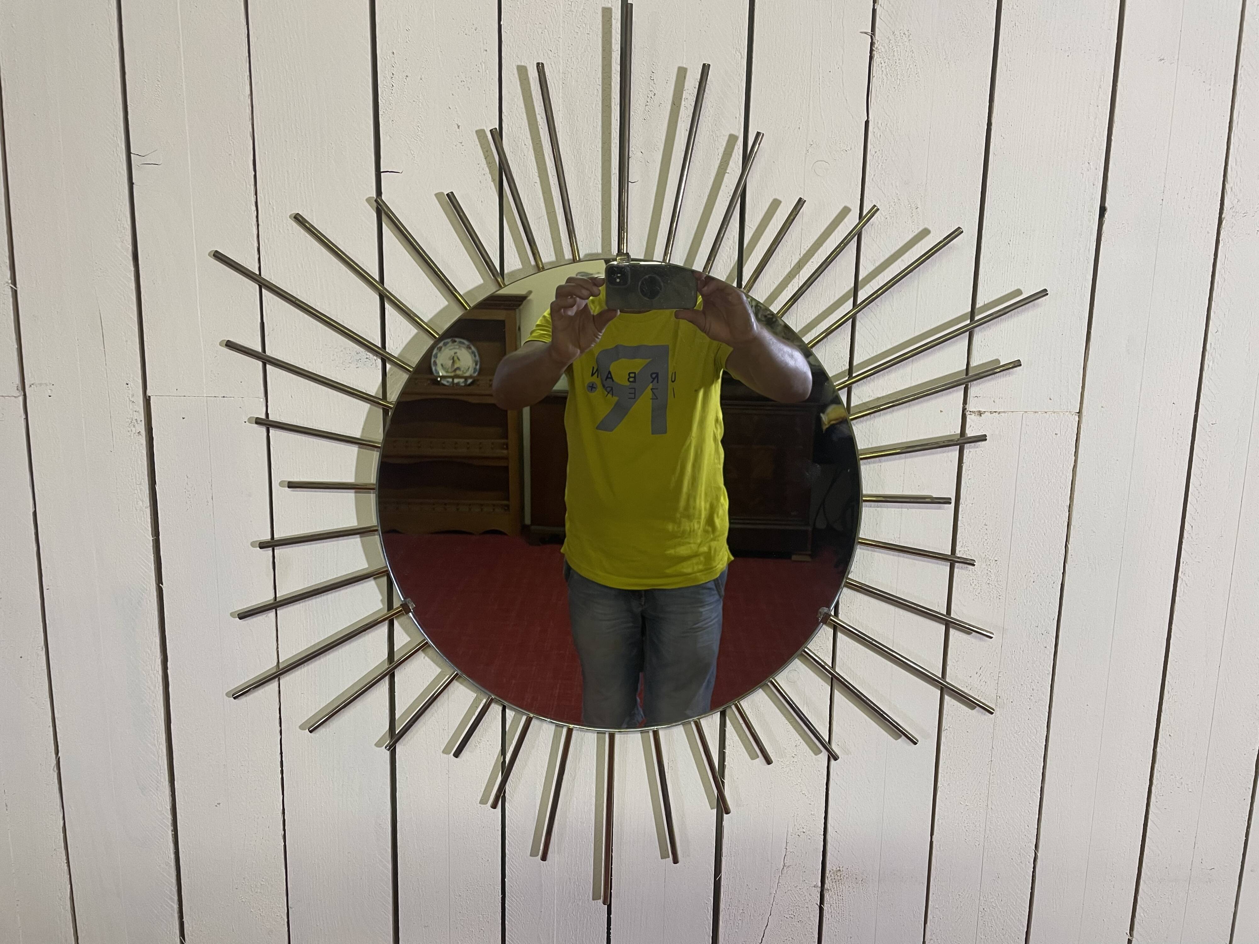 Golden metal sun mirror year 60