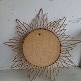 Vintage sun mirror in woven rattan