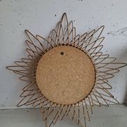 Vintage sun mirror in woven rattan