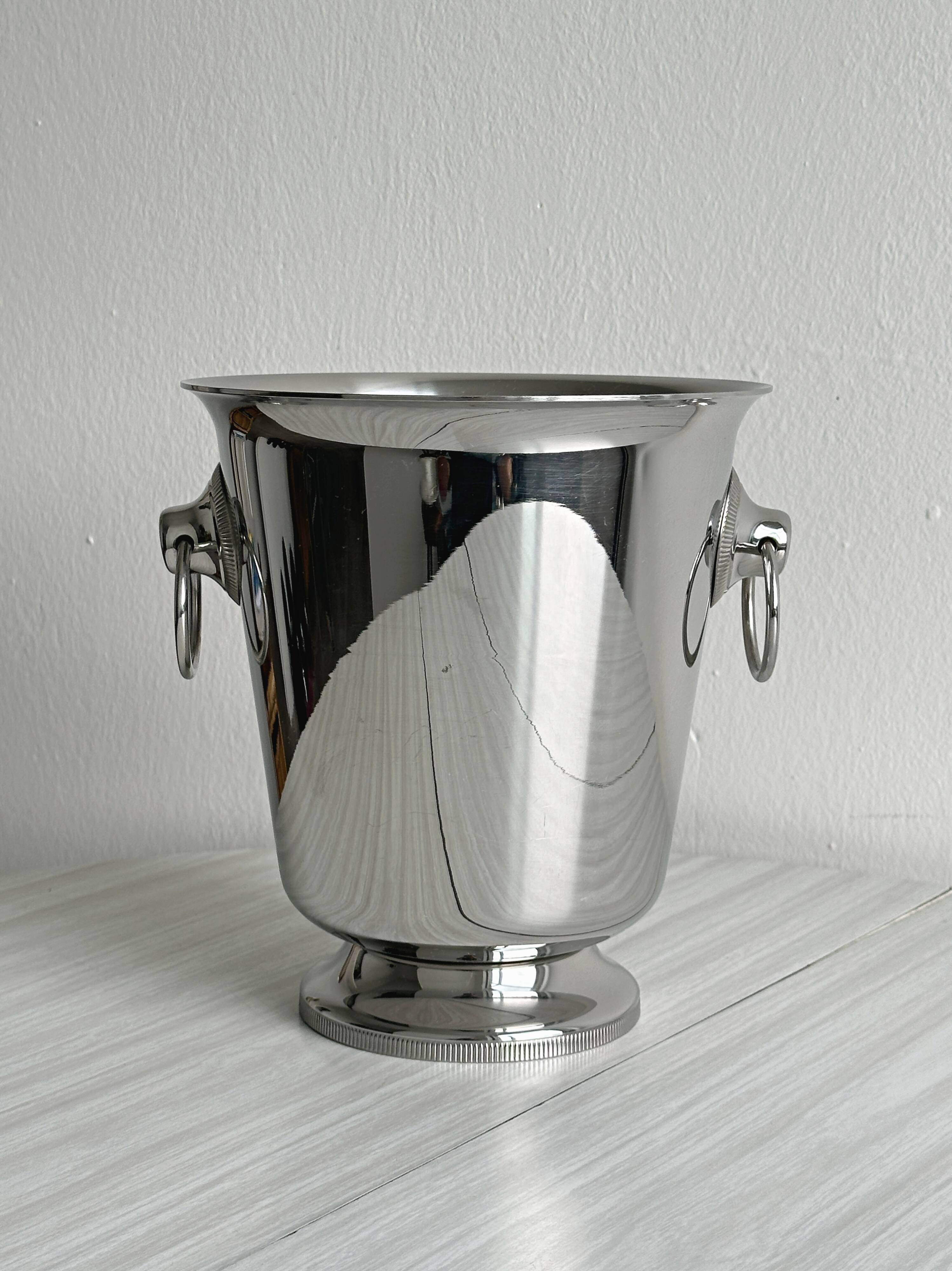Shiny stainless steel champagne bucket