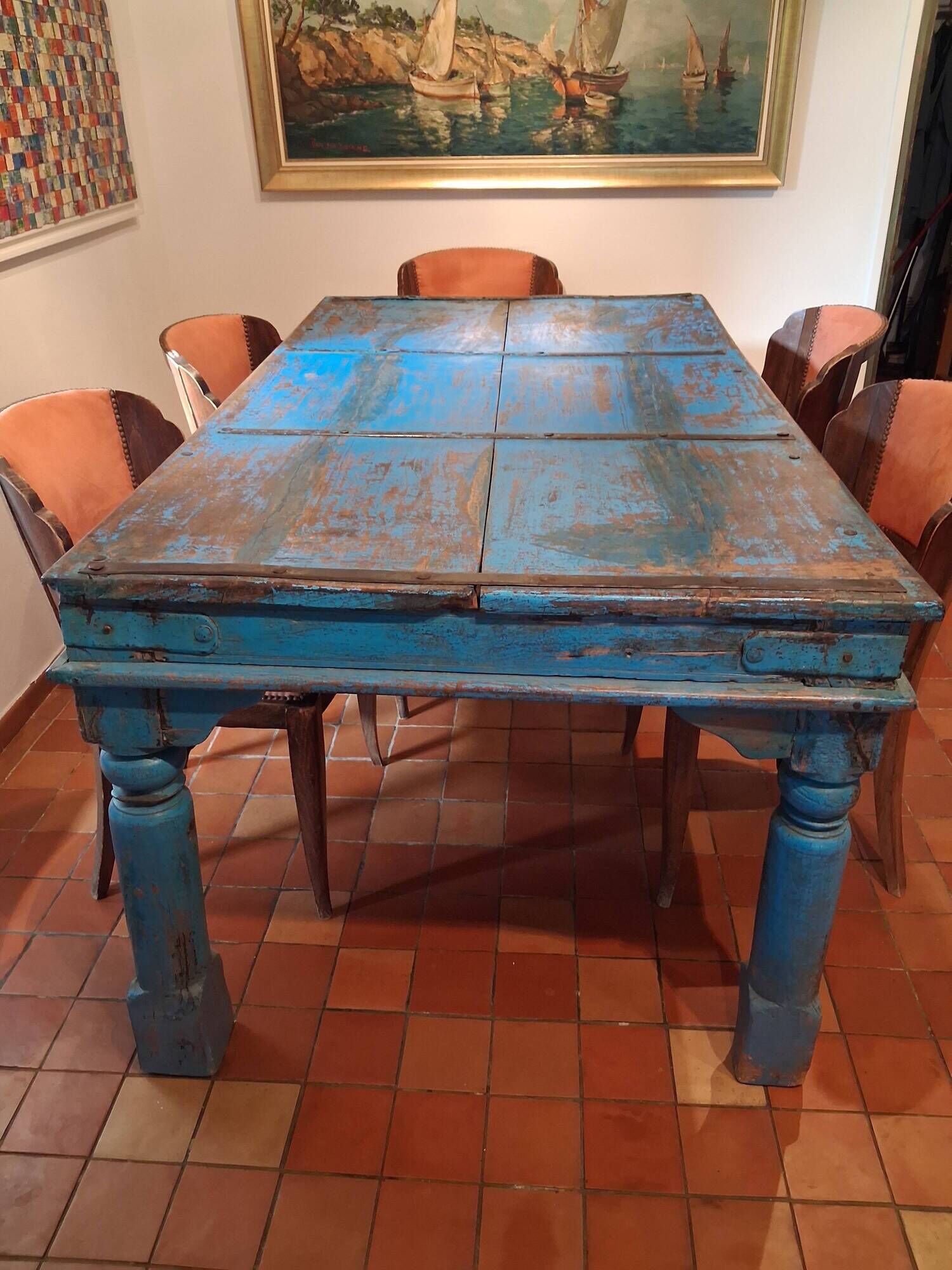 Large antique Indian dining table made of teak wood with patina.