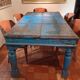 Large antique Indian dining table made of teak wood with patina.