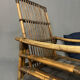 Fauteuil en rotin et son assise neuve extérieure