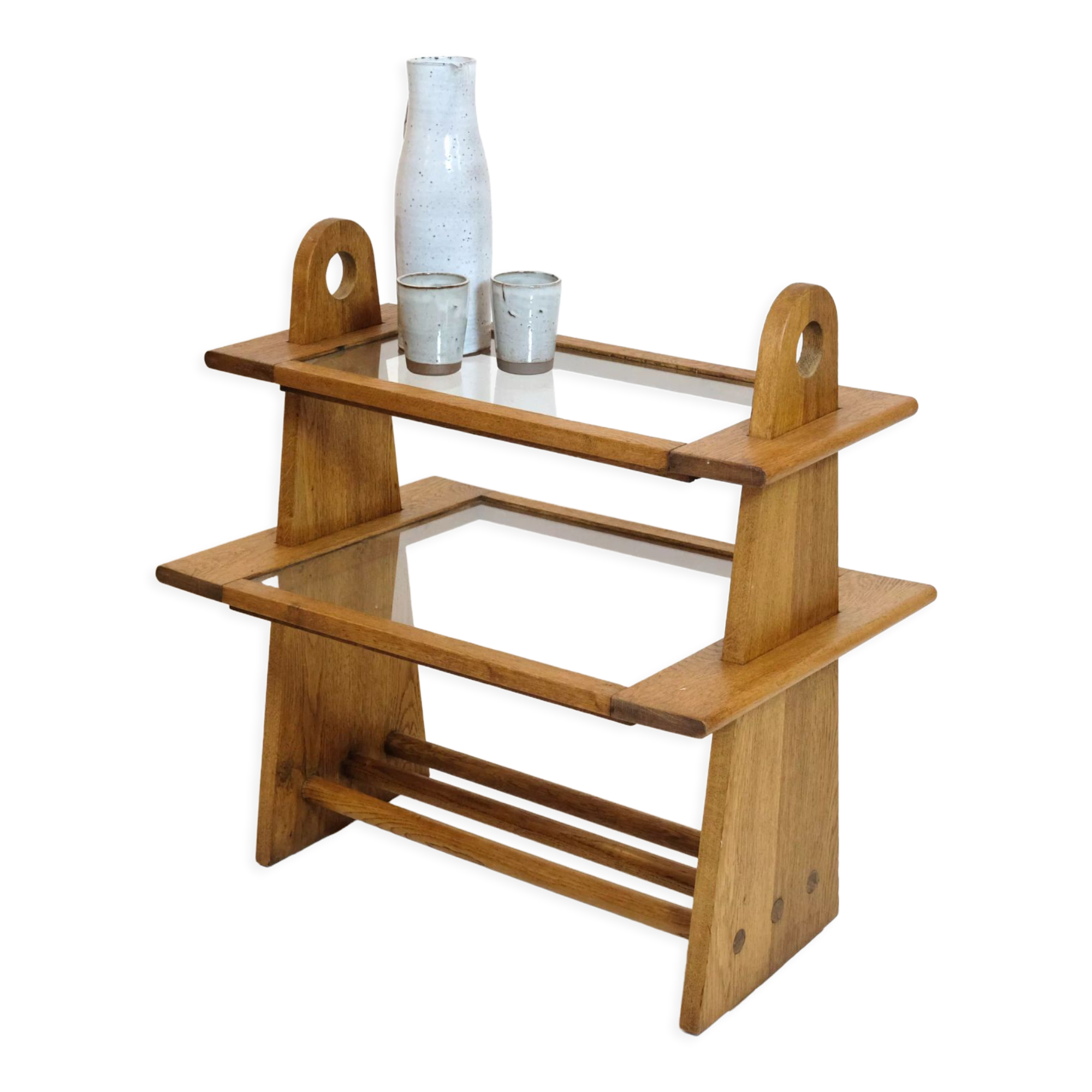 Served in oak and glass from the 50s and 60s.