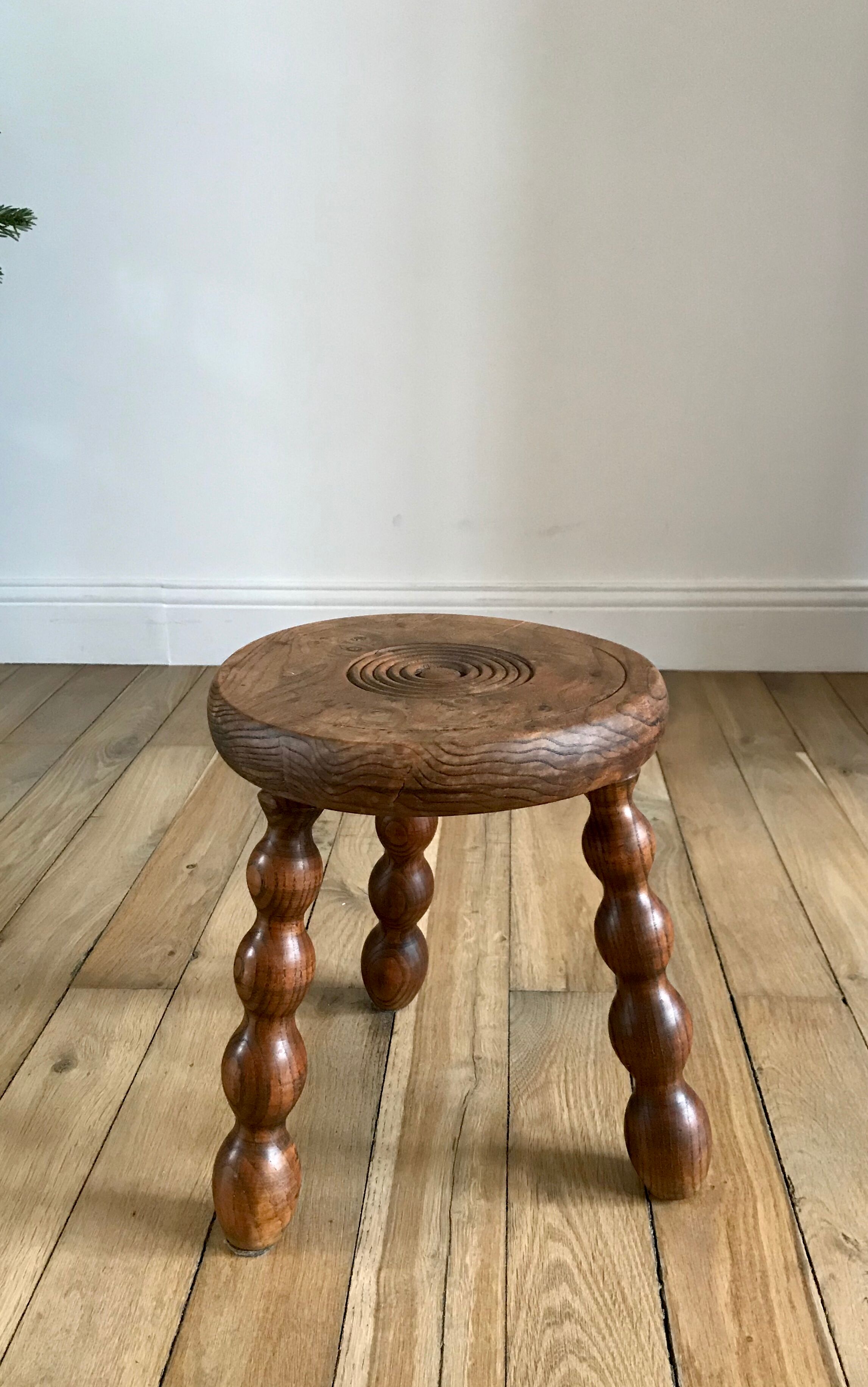 Low wooden stool turned solid 70s