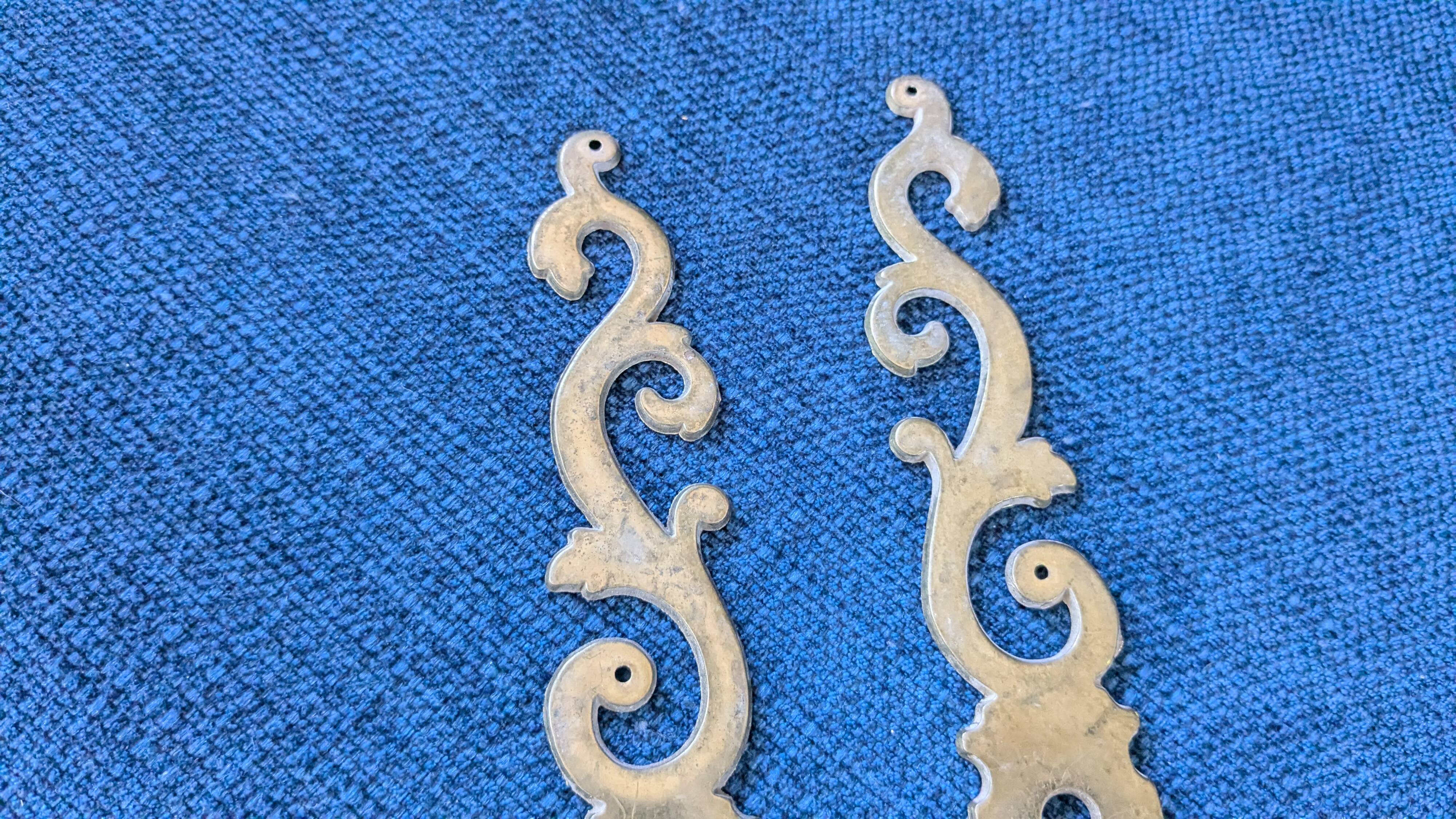 Pair of brass keyholes