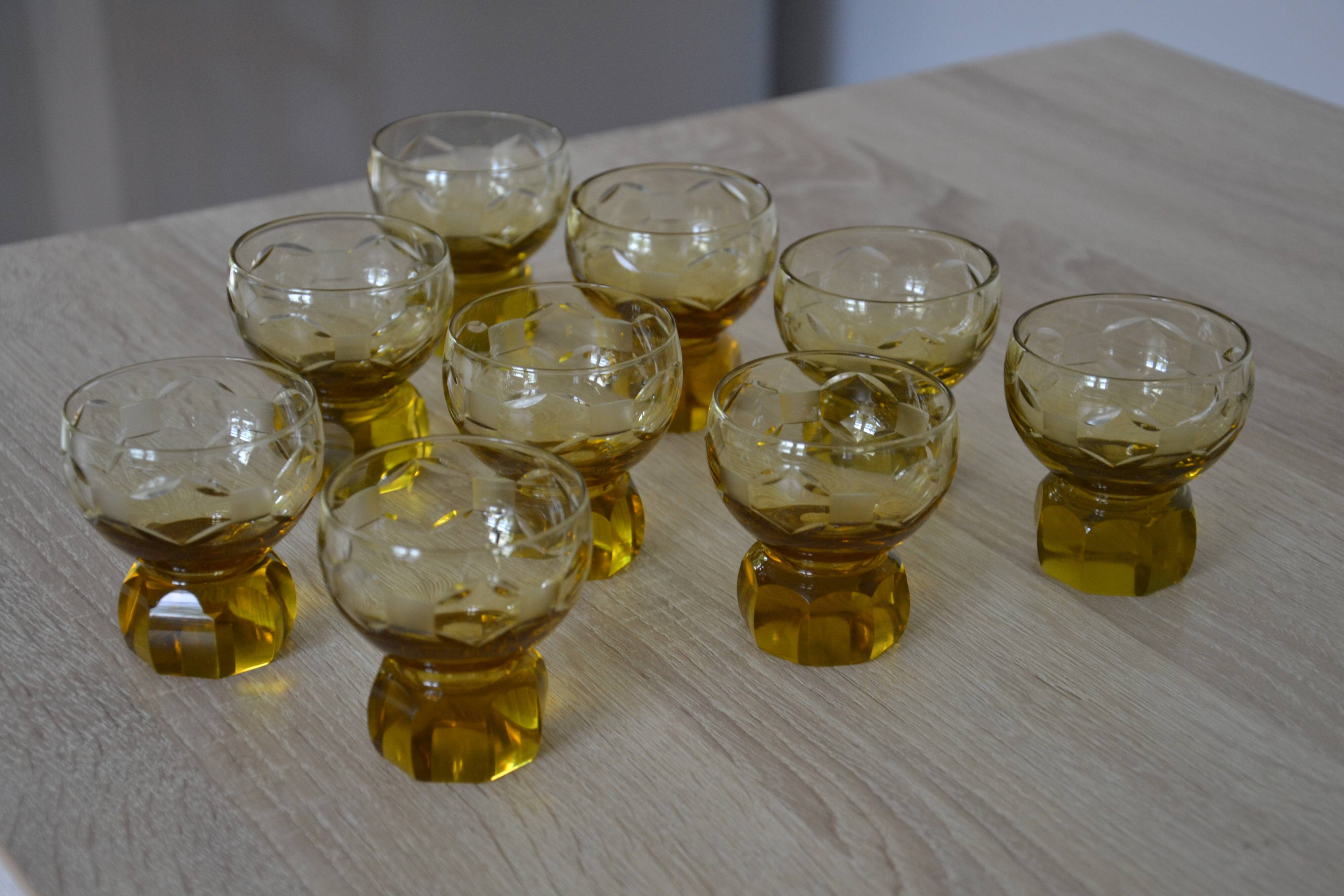 9 small amber art deco glasses