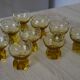 9 small amber art deco glasses