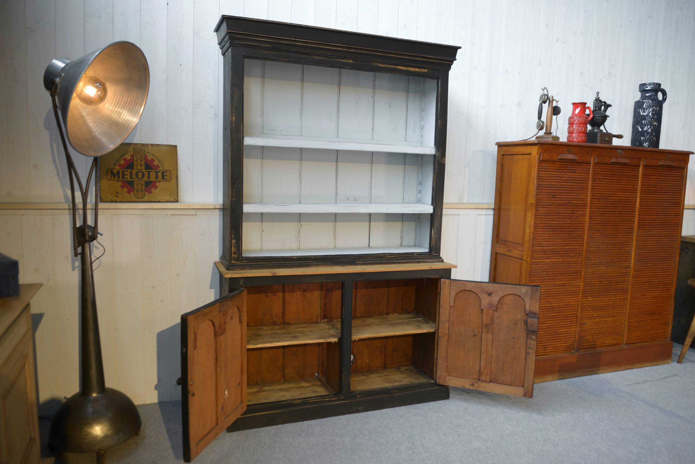Two-body sideboard with black patina and white interior, 1950s