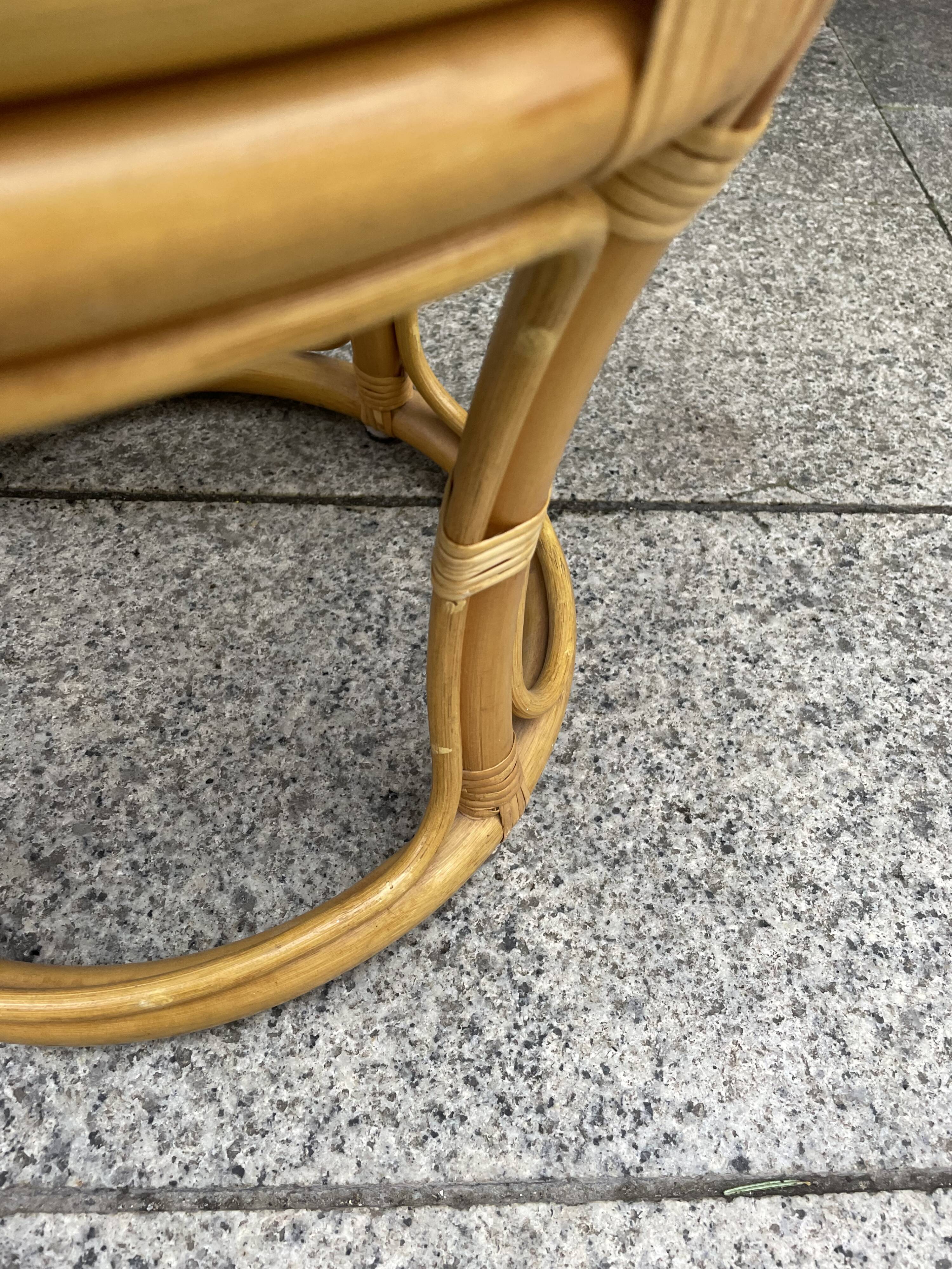 Rattan pouf with refurbished cushion
