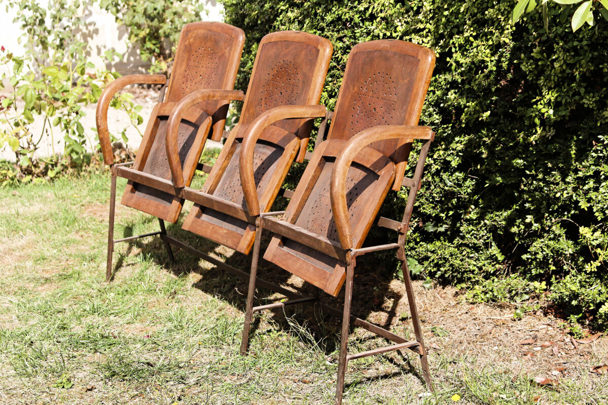 Row of theater folding seats, early twentieth century