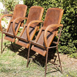 Row of theater folding seats, early twentieth century