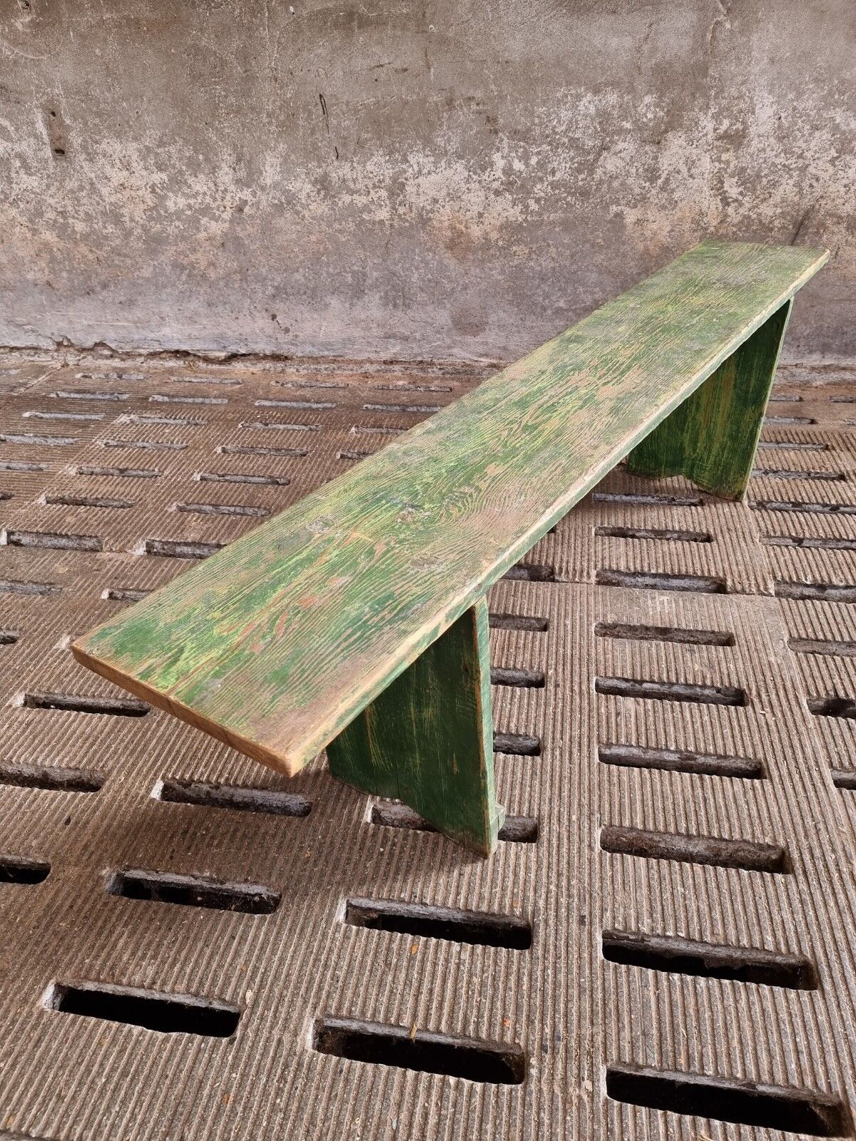 Old wooden bench side table grass green