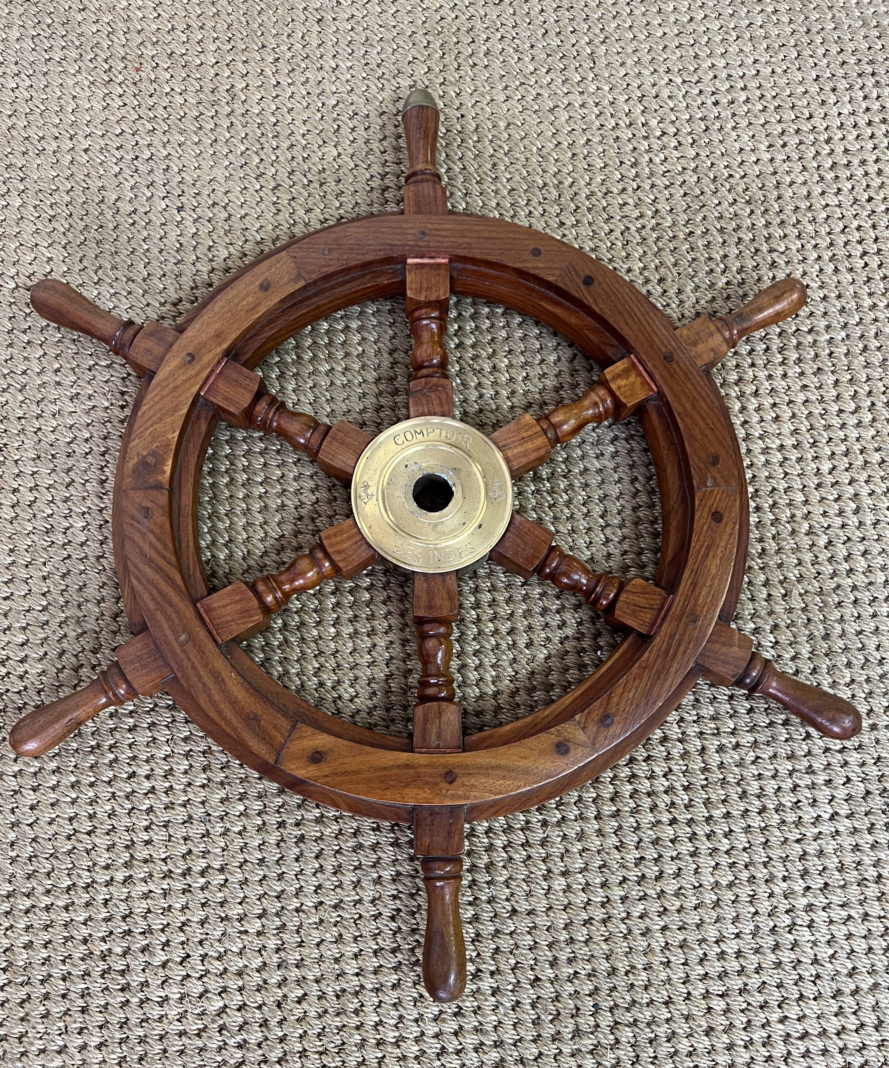 Rudder bar wheel boat in wood and brass "Comptoir des Indes" shelf