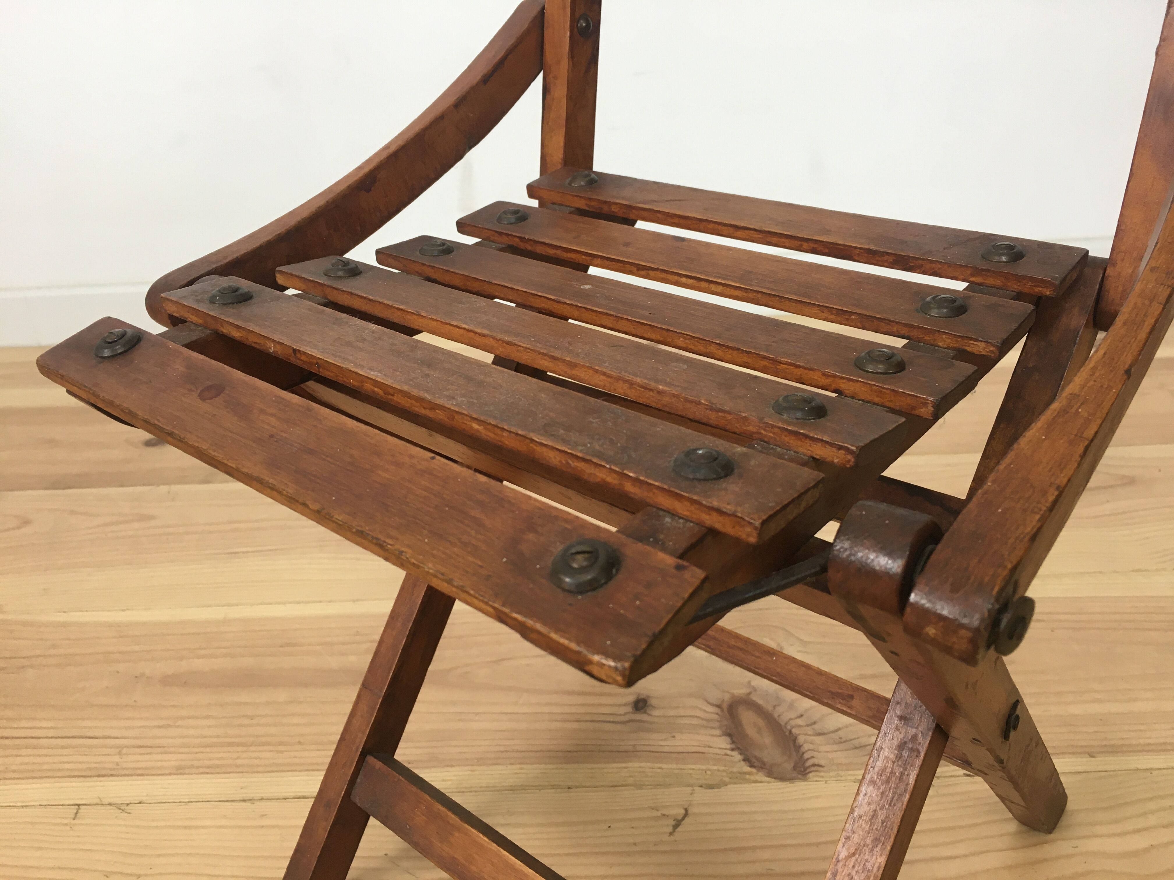 Children's folding chair in wooden slats
