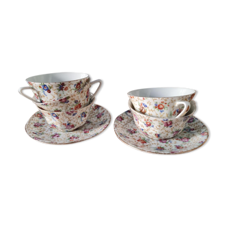 Small British coffee cups with flowers and saucers