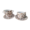 Small British coffee cups with flowers and saucers