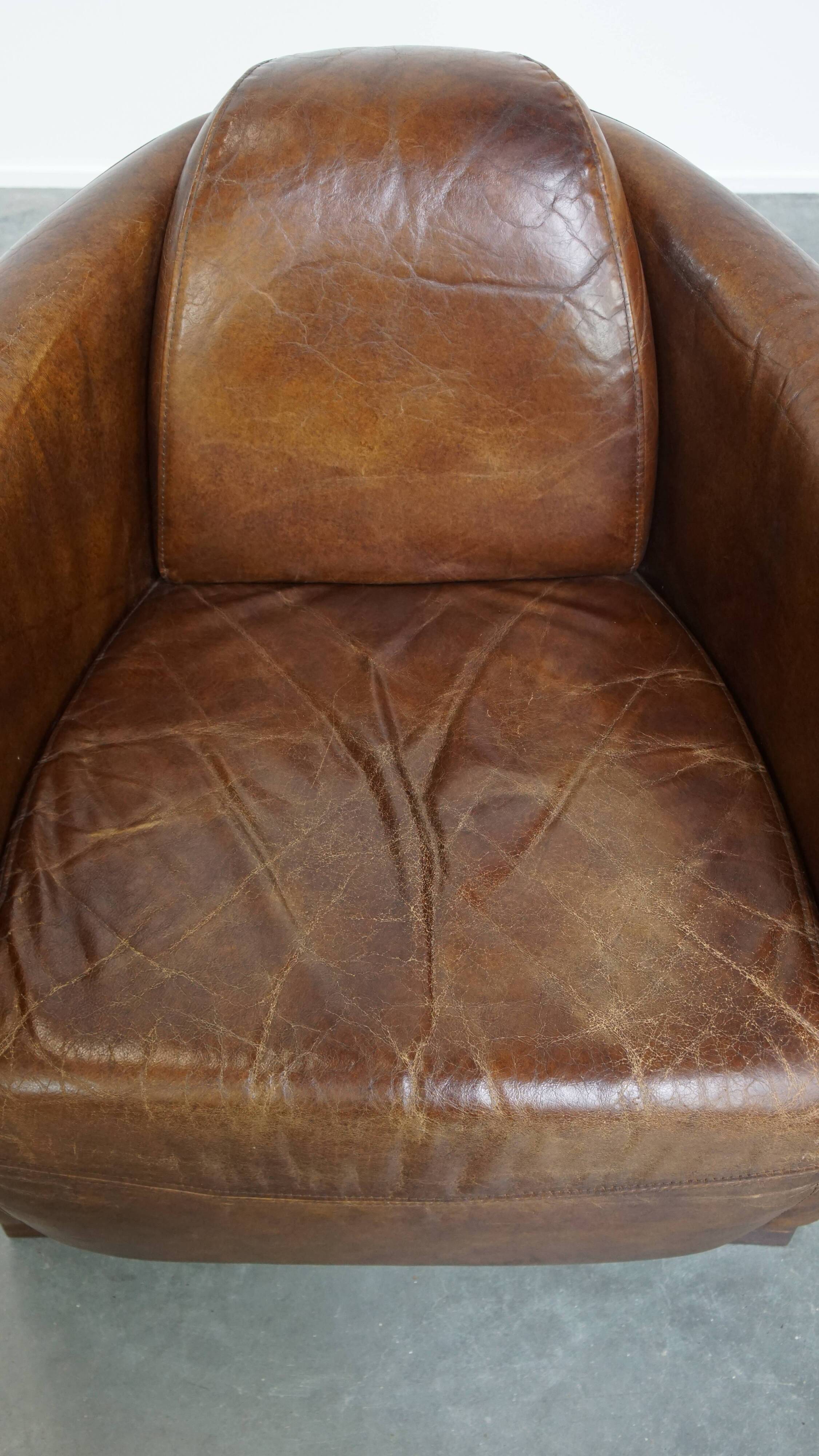 Brown Aviator design armchair made of cowhide leather