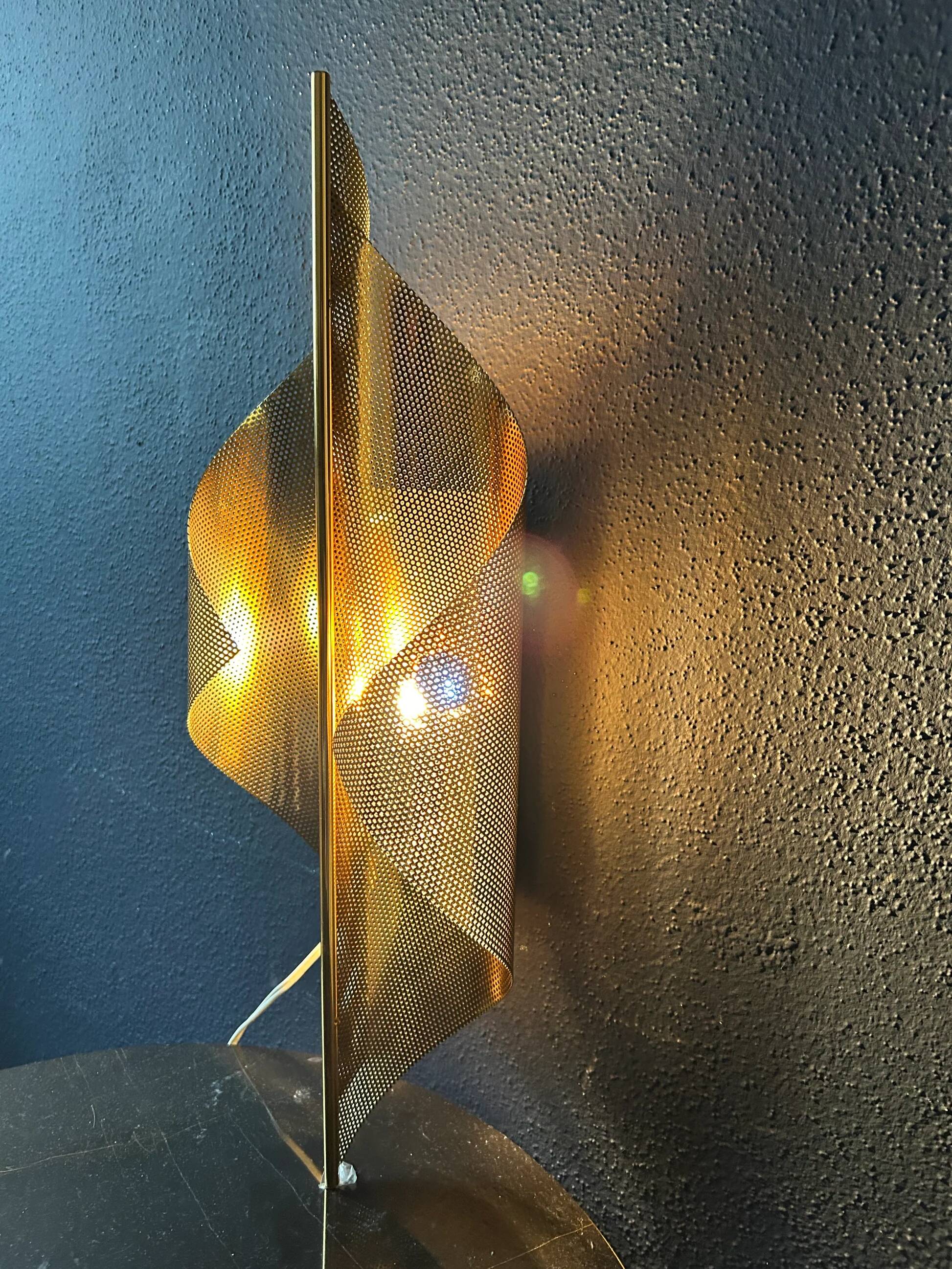 Pair of perforated brass wall lights by Christoph Palme, Germany, 1980s.