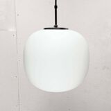 Minimalist suspended glass ball lamp from the vintage German space age by Glashütte Limburg, 1970s.