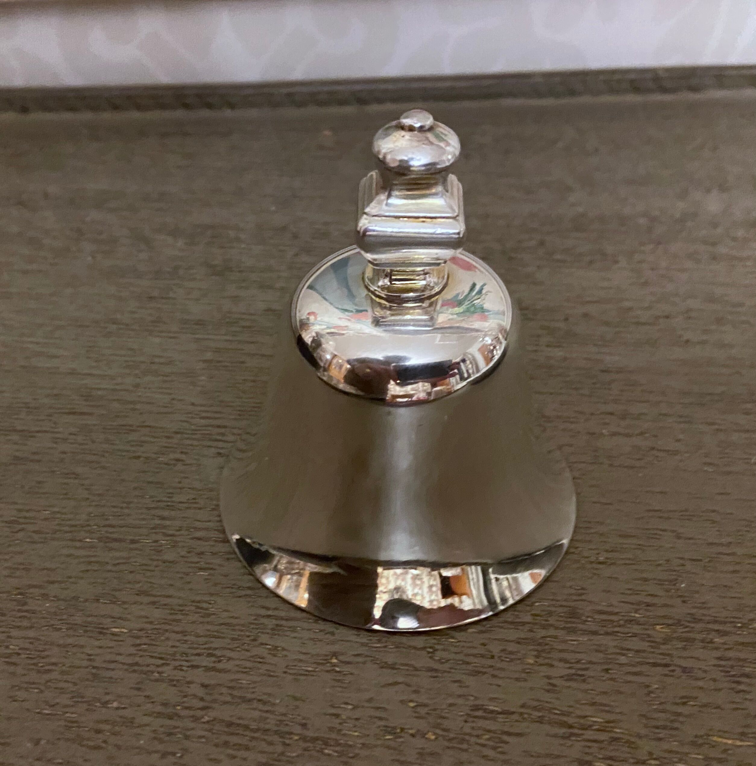 Small bell silver metal