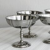 6 silver stainless steel bowls.