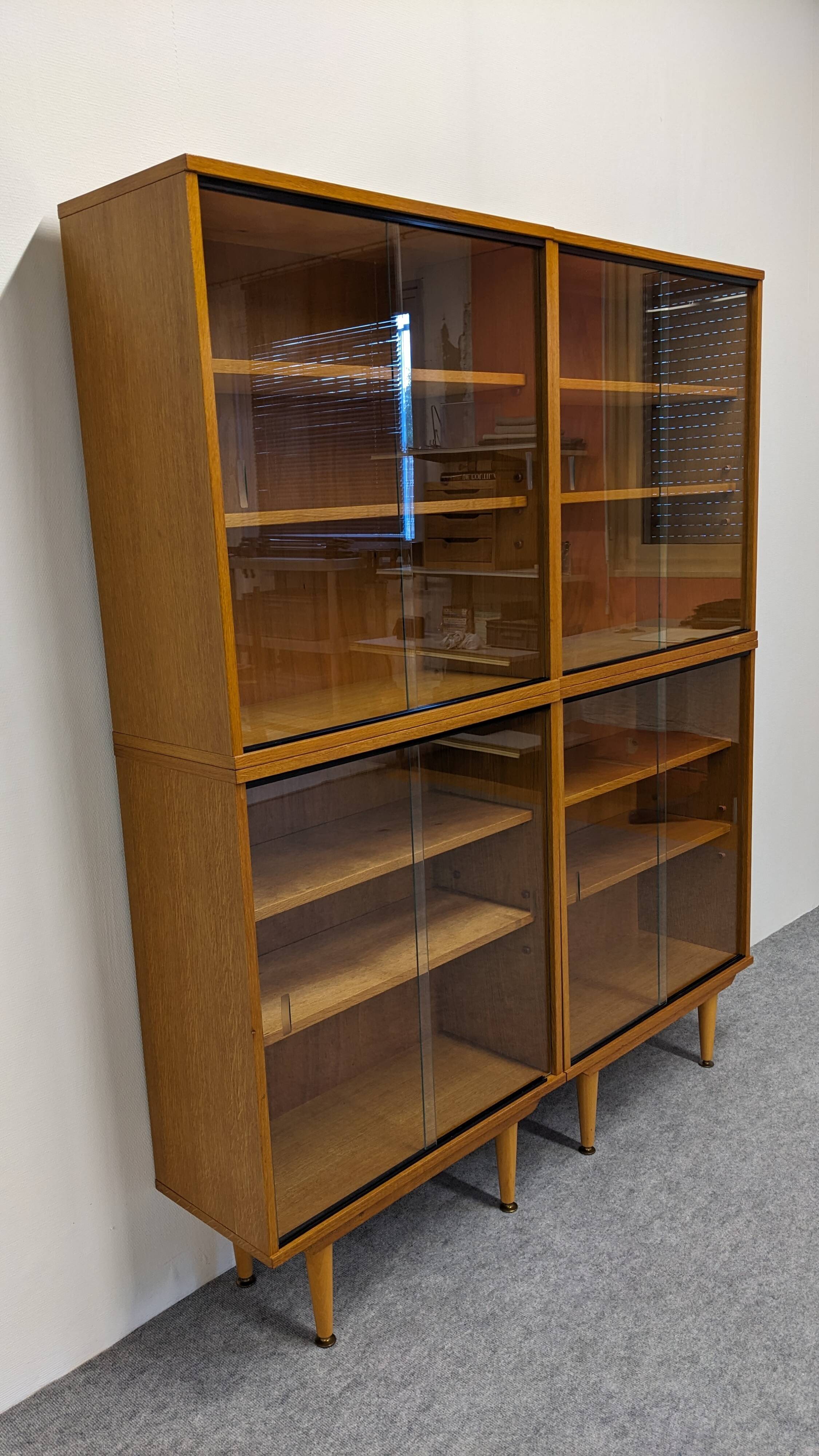 Library or display cabinet with 4 modules in light oak, France around 1960.