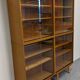 Library or display cabinet with 4 modules in light oak, France around 1960.
