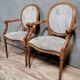 Pair of Louis XVI style armchairs with medallion backs, 20th century