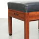 Ottoman en cuir noir au design Art Déco