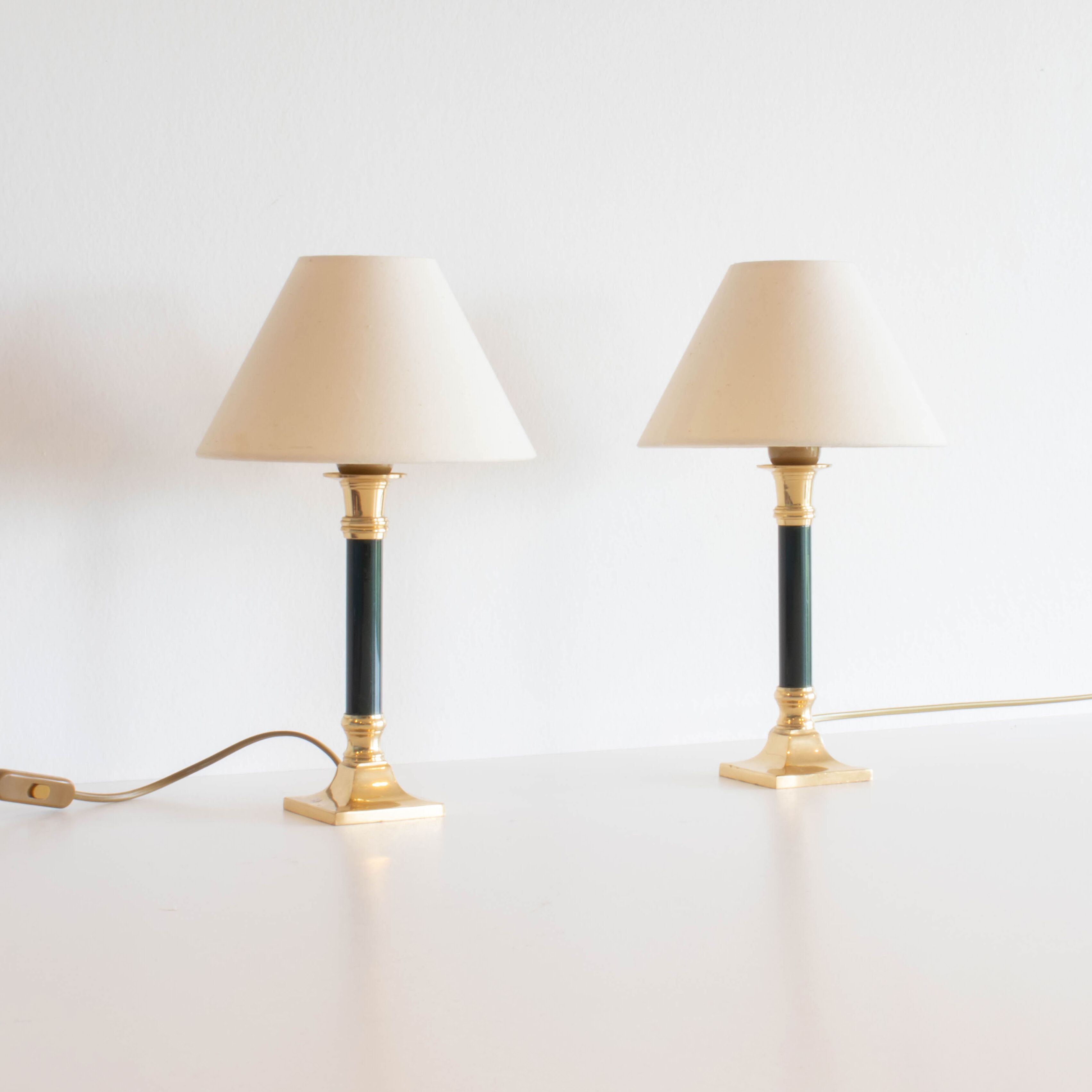 A set of two column lamps in hollywood regency style