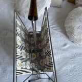 Vintage metal and plastic-coated fabric magazine rack