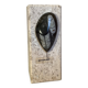 An asymmetrical travertine and fossil bookend.