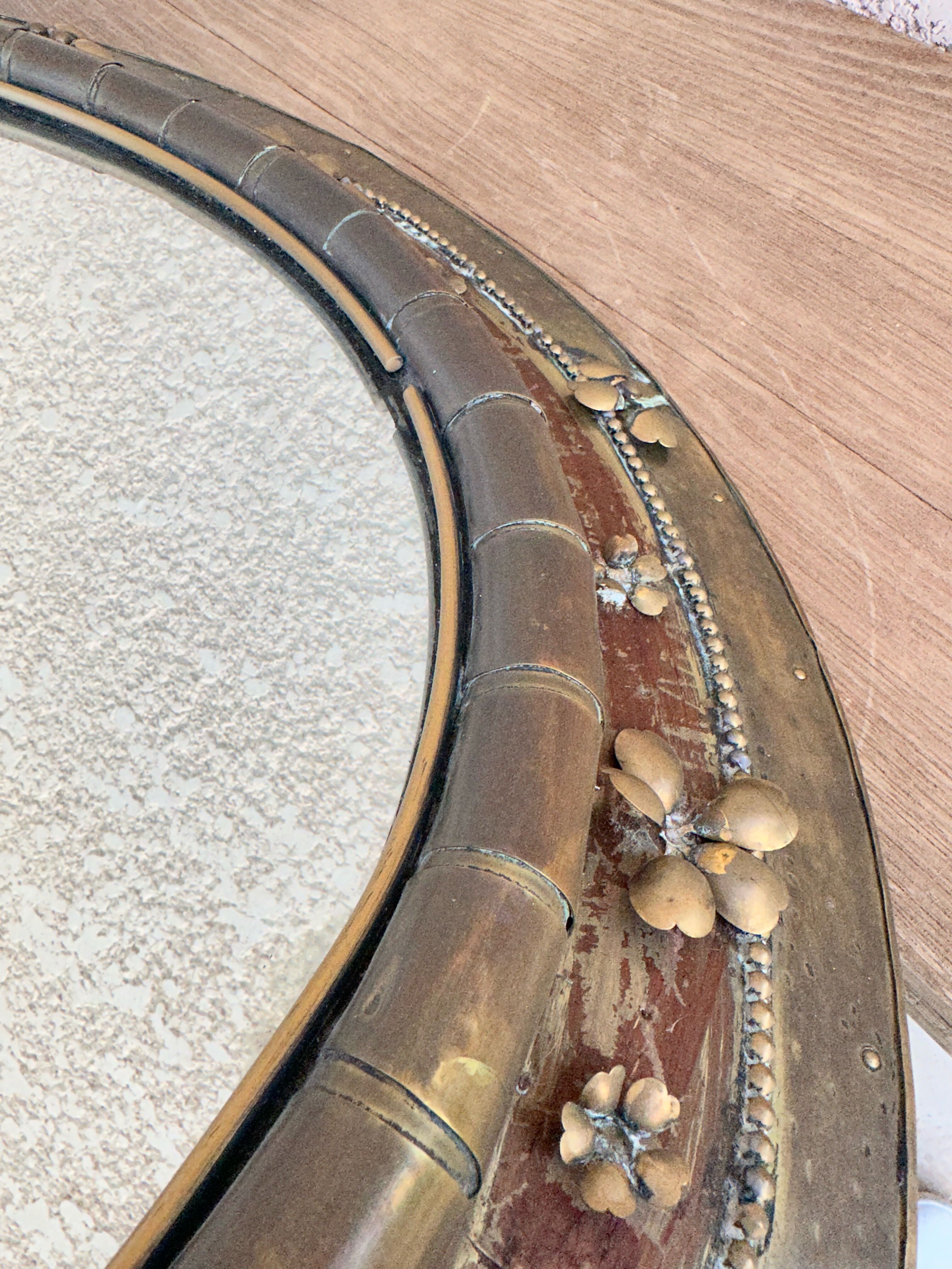 Round mirror in worked copper, Italy 1950