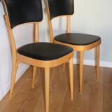 5 baumann chairs with large backs in black faux leather.
