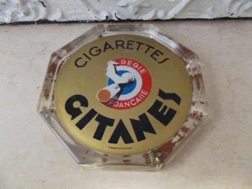 Picks up vintage advertising money Gitanes