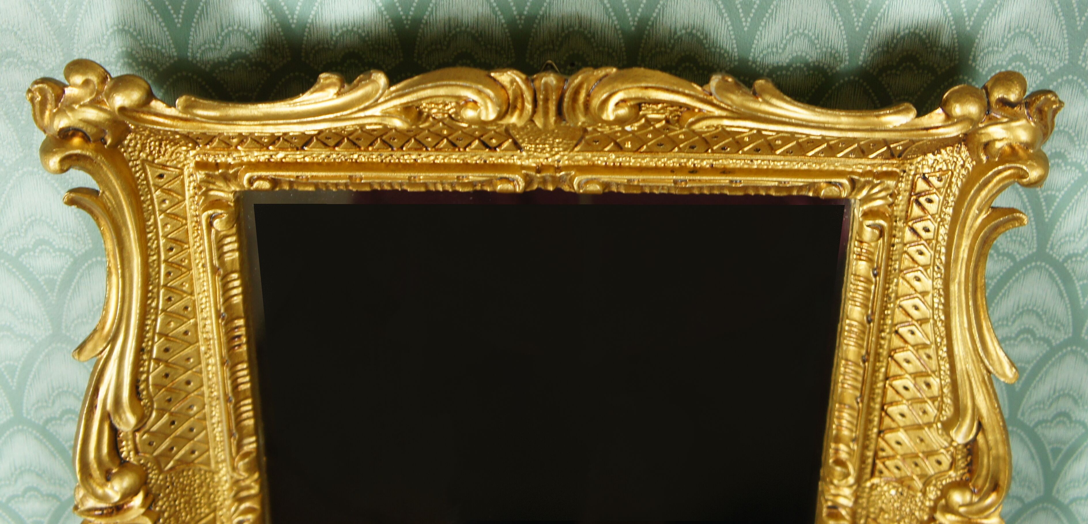 Entrance console & mirror sound, gilded around 1970