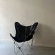 designer butterfly armchair in chrome and black leather