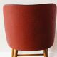 Chaise en skai rouge, pieds compas, années 60