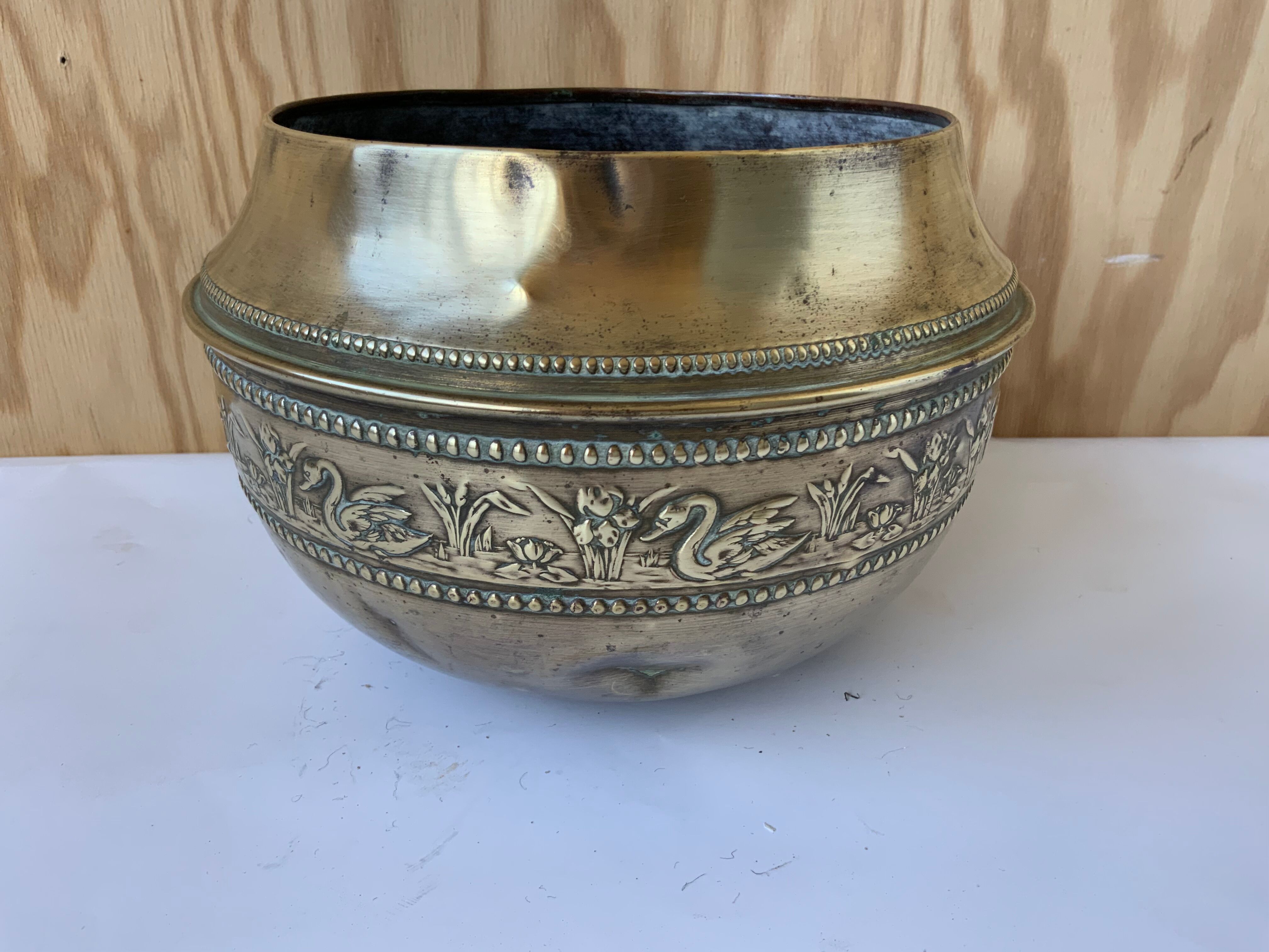 Brass pot cover