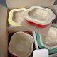 Four Le Creuset ceramic casseroles