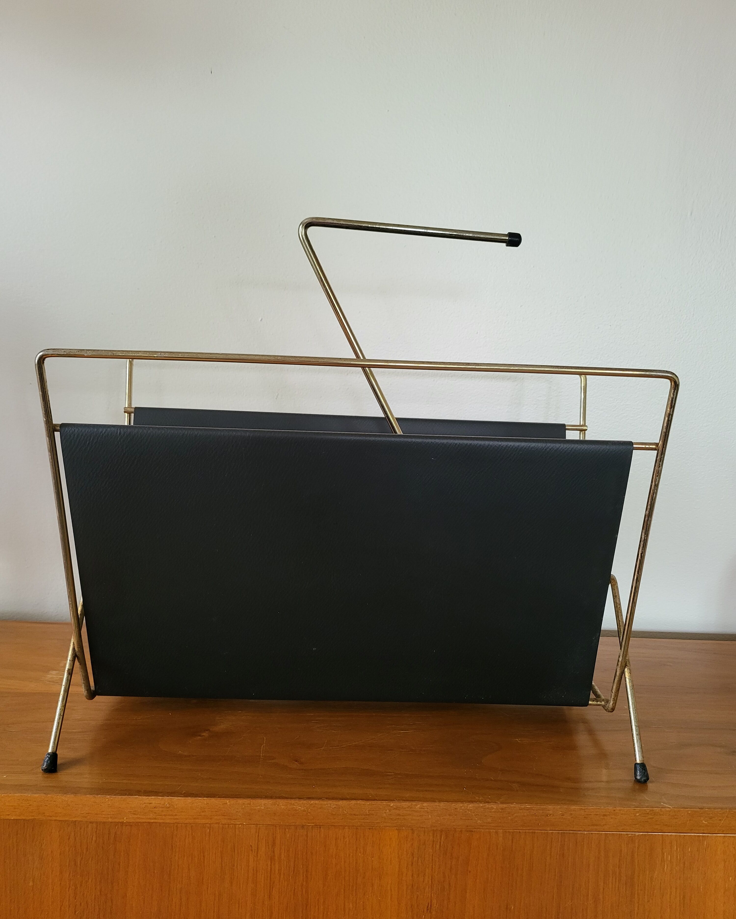 Vintage metal magazine rack in gold and black vinyl Newspaper holder
