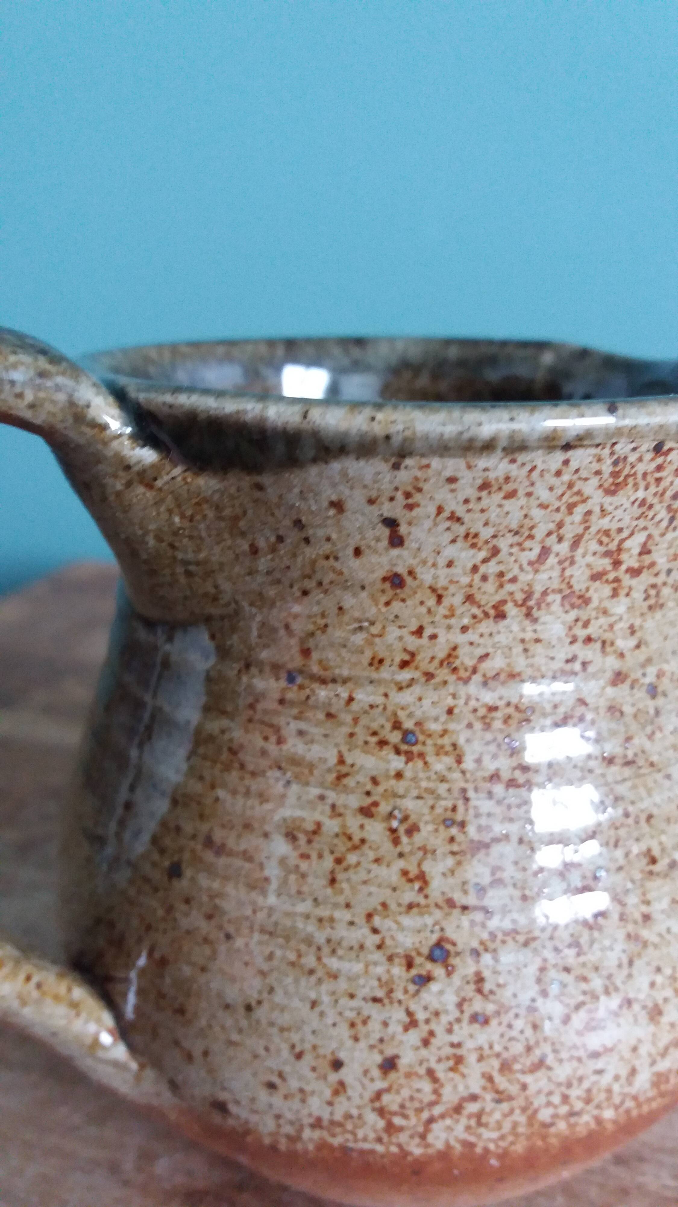 Jug with a milk jug signed, Beceleuf