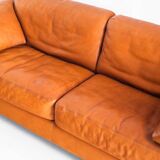 Three-seater sofa in cognac-colored leather produced by De Sede. Model DS-17/123, Switzerland, 2000s