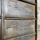 Furniture with 8 metal and wood flaps.