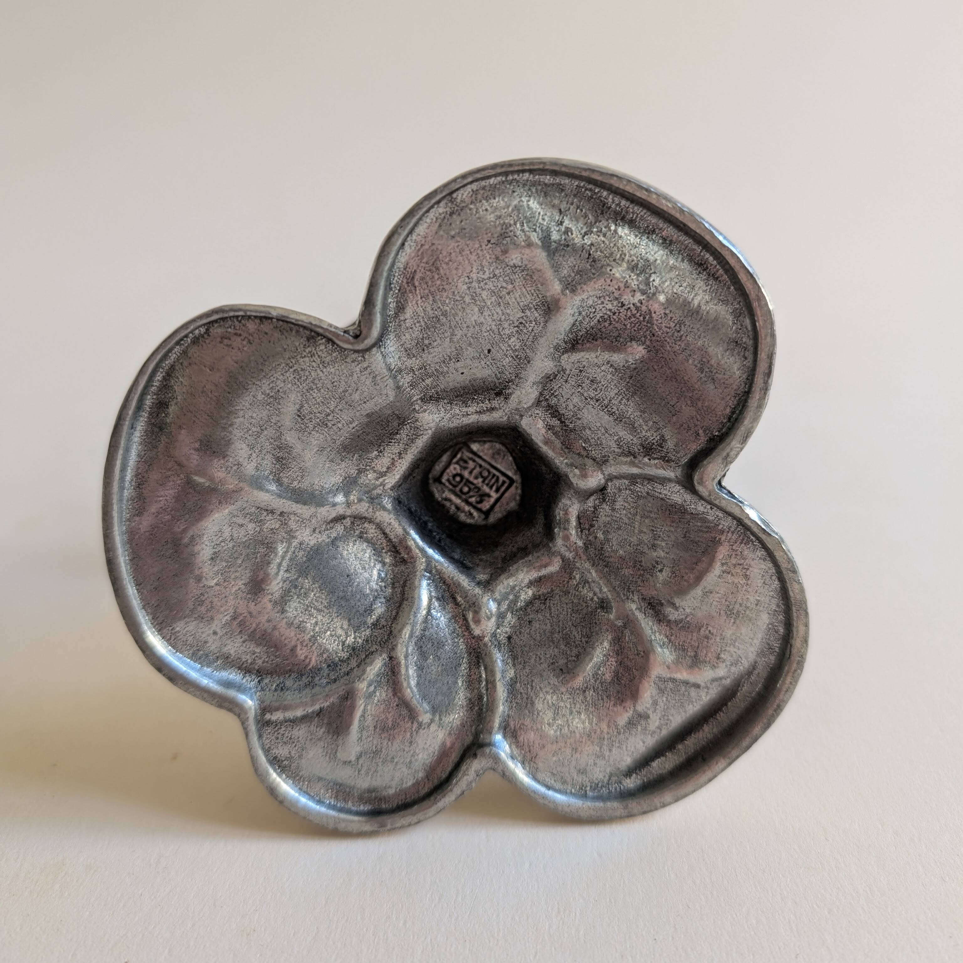 Tin candle holder